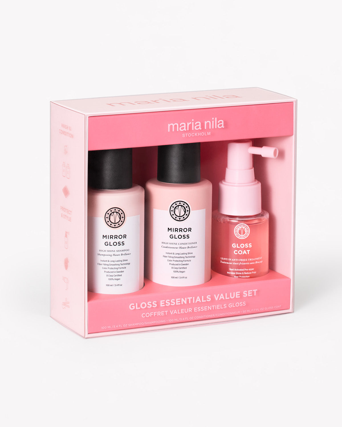 Hair care gloss essentials set with shampoo, conditioner, and styling spray in pink packaging.