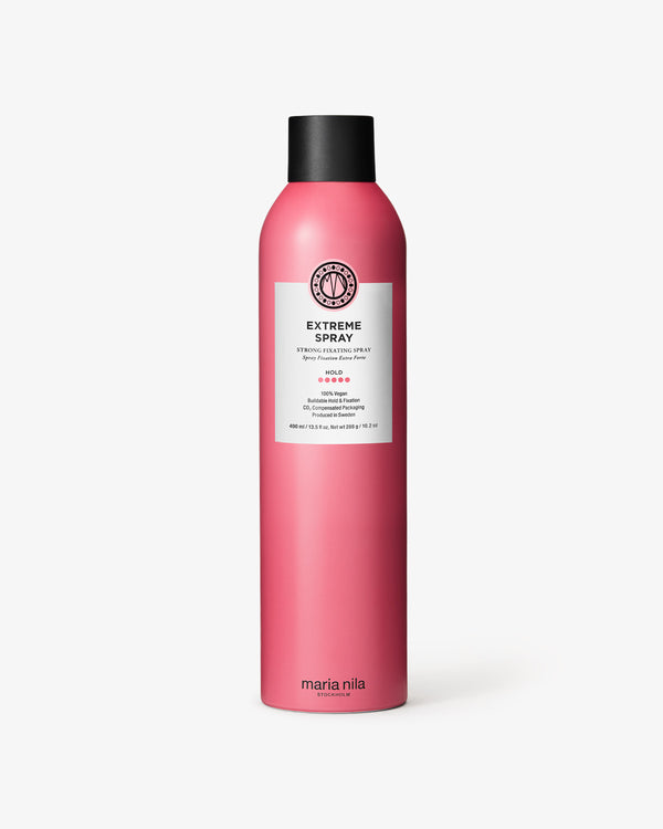 Pink bottle of Extreme Spray 300ml with black cap on white background