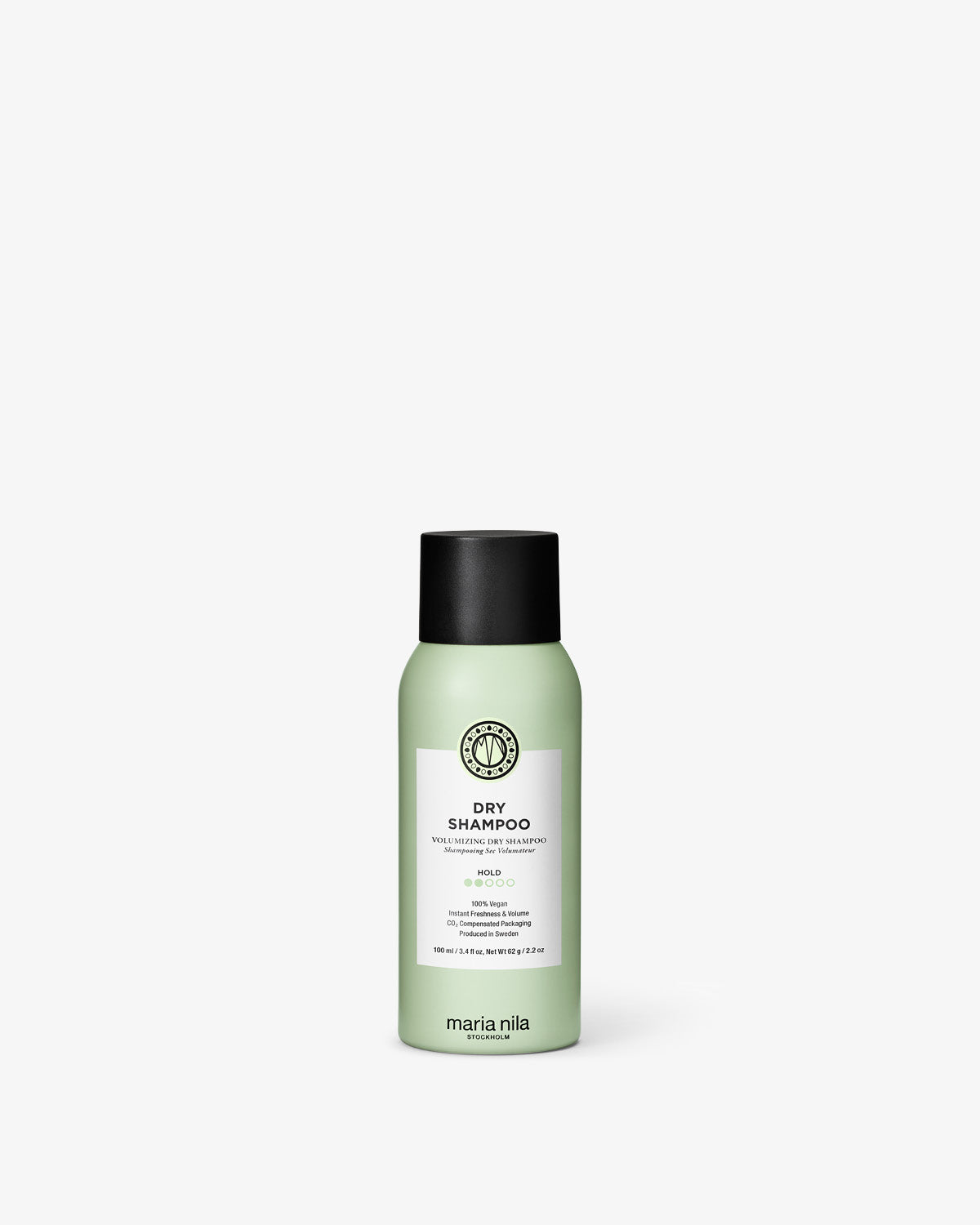 Green bottle of Maria Nila dry shampoo on a white background