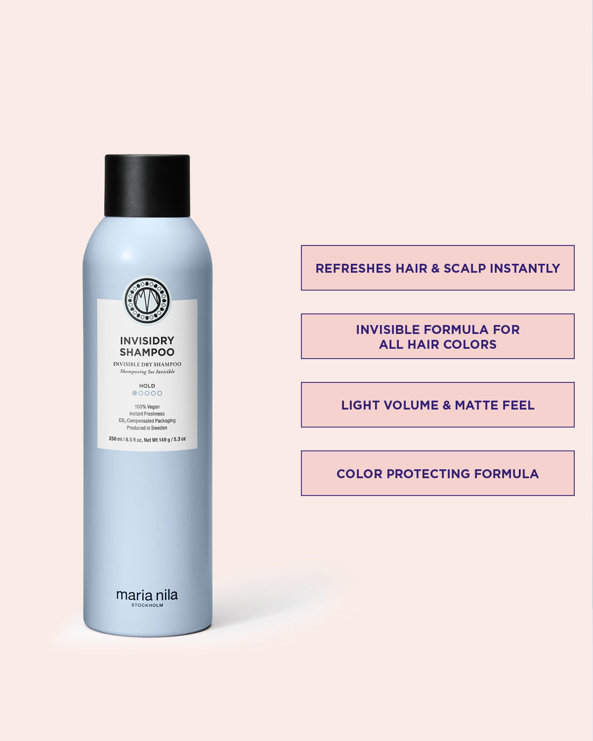 Invisidry Shampoo bottle with product features on a pink background