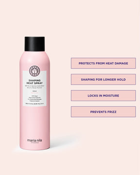 Pink Shaping Heat Spray bottle with black cap on a light pink background, featuring product USPs.