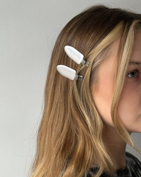 Hair clips in blonde hair 