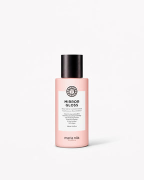 Pink travel-sized Mirror Gloss Conditioner bottle with black cap and white label by Maria Nila.