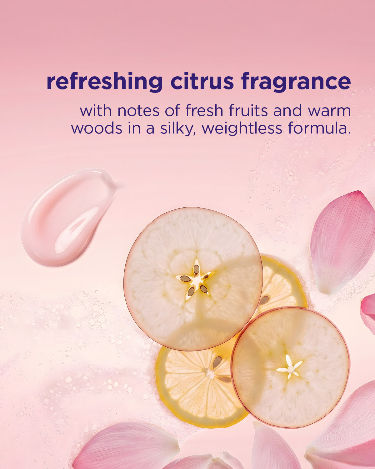 Mirror Gloss Conditioner with translucent pink cream swatches and citrus fruit slices on a soft pink background.