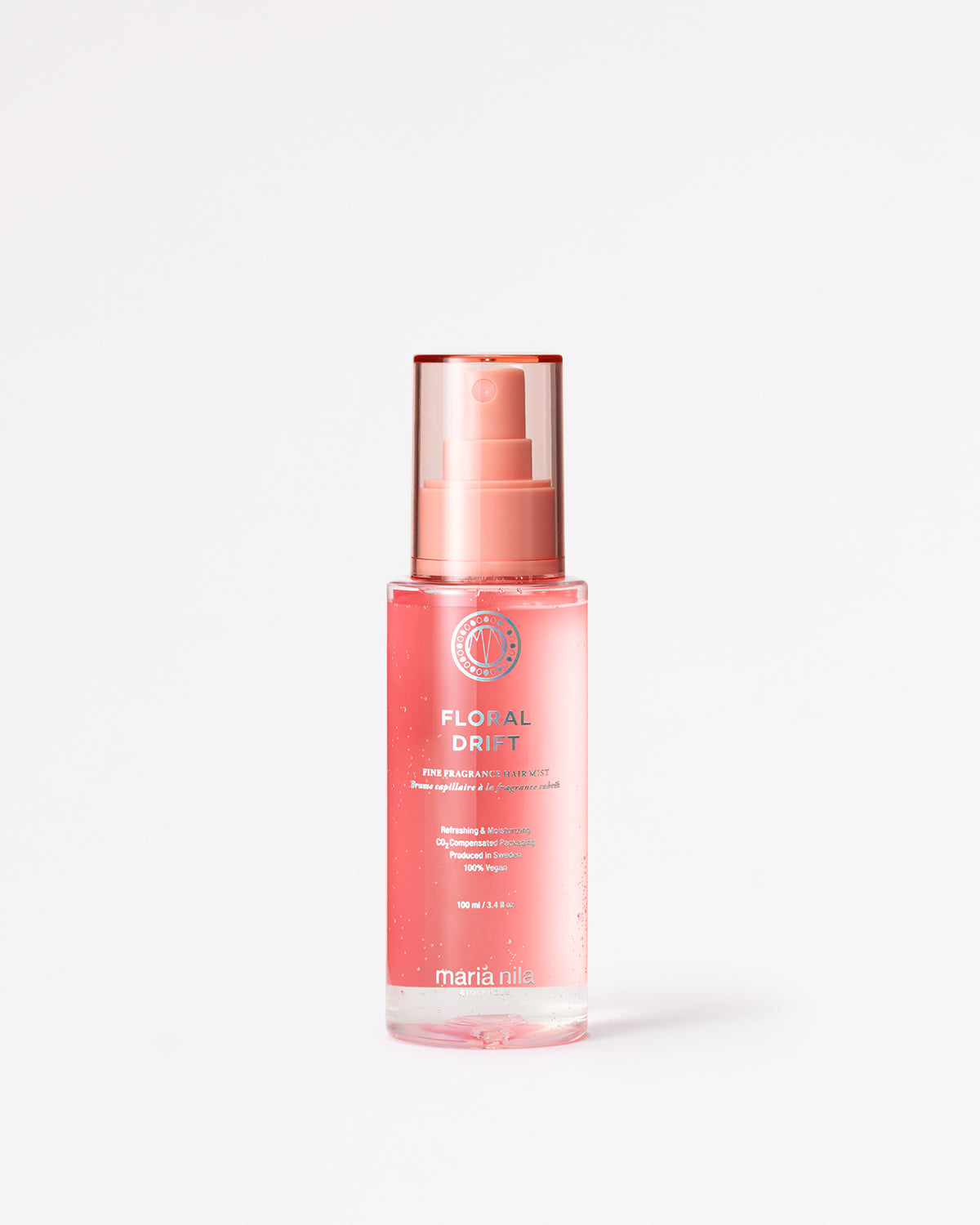 Pink bottle with Maria Nila Floral Drift on a white background
