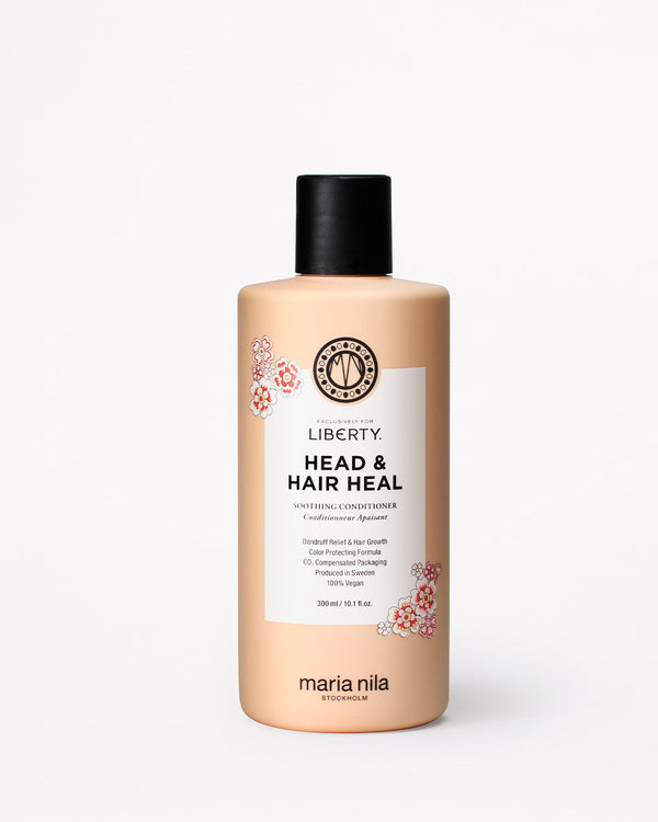 Bottle of Maria Nila Exclusively for Liberty Head & Hair Heal conditioner on a white background