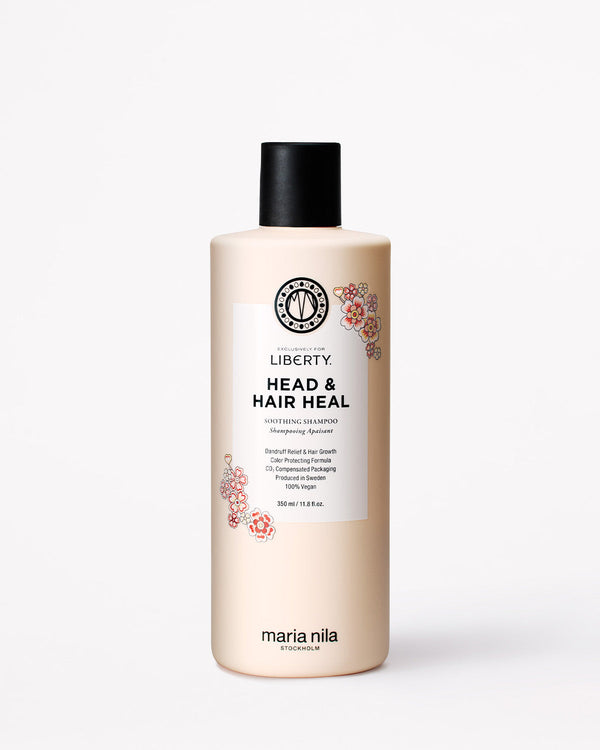 Bottle of Maria Nila exclusively for Liberty Head & Hair Heal shampoo on a white background